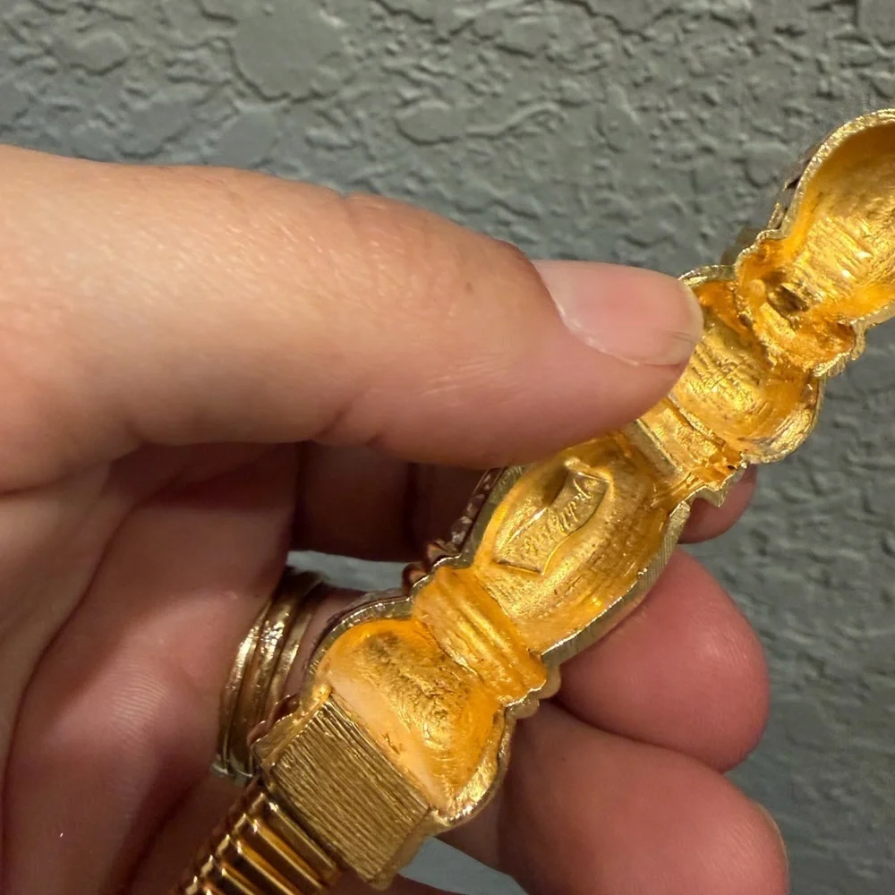 vintage judith leiber gold stretch